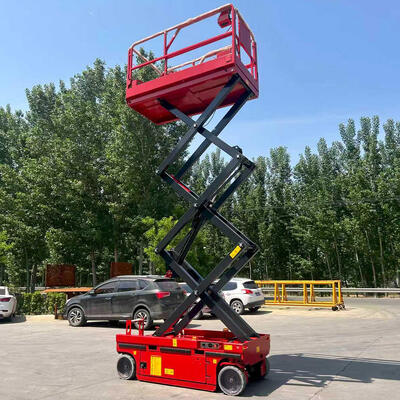 Mała czerwona samojezdna platforma nożycowa hydrauliczna 320 kg 10 m